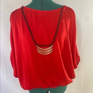 Red Shirt, Gold Necklace